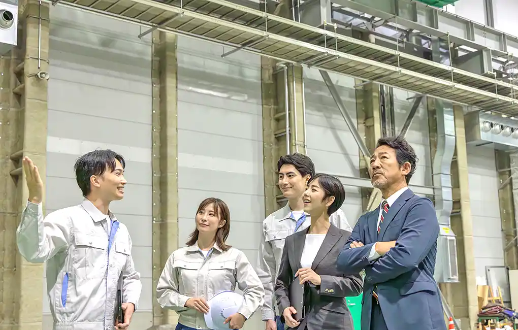 Participants on an inspection tour visiting facilities and sites