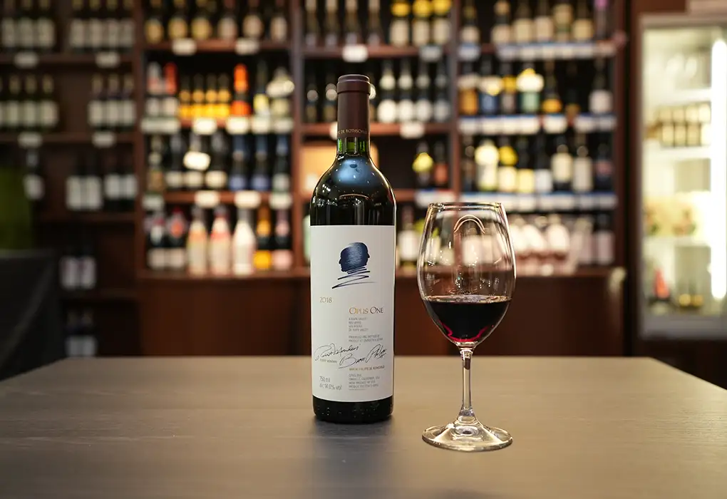 Wine bottle and glass displayed inside Felion wine shop